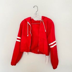 Red cropped windbreaker jacket from PacSun J. Galt